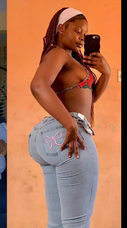 Azigi of high school graduate in bathroom